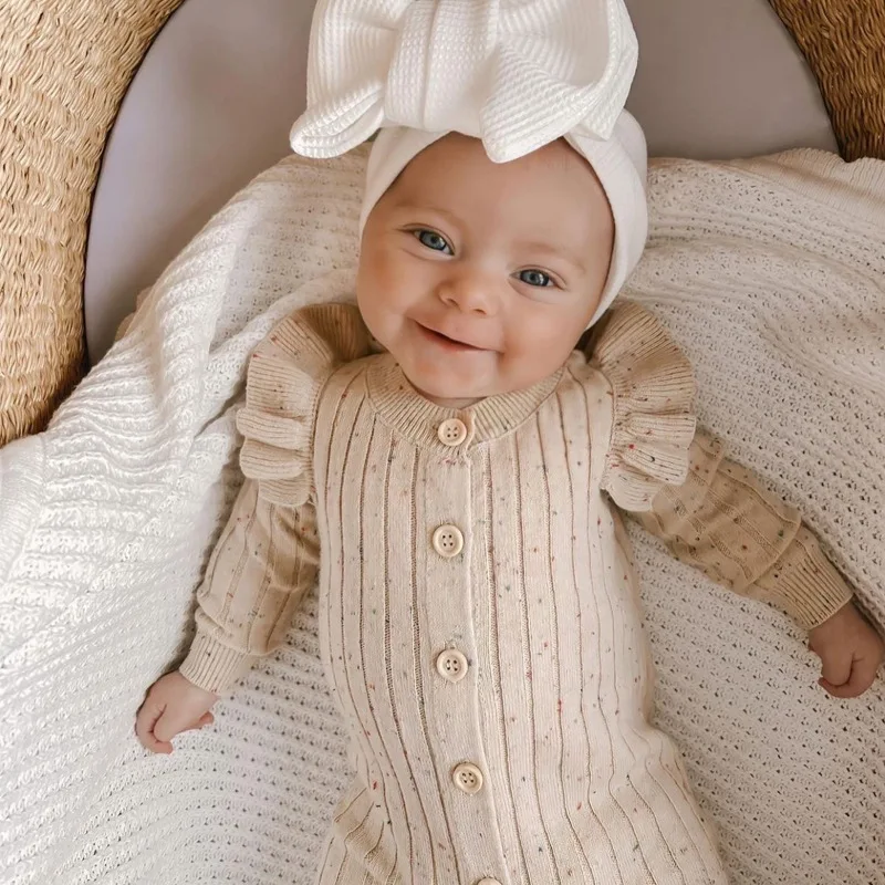 MiniAurora – Soft & Elegant – Knitted baby onesie with angel wings and headband