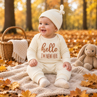 Thumbnail for CuddleBaby – Hi, I'm new here – Baby Jumpsuit met Beanie Set