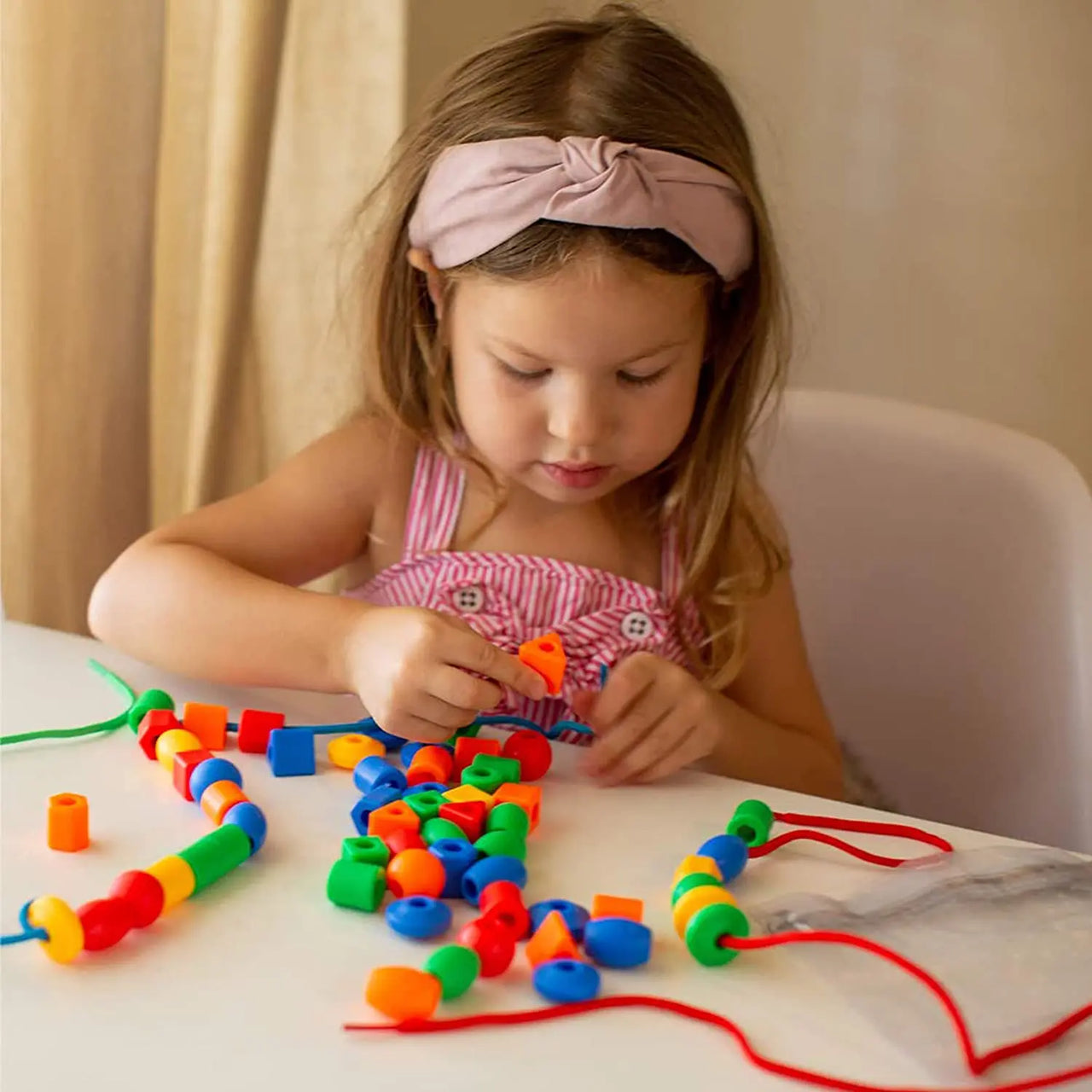 Rainbow Lacing Beads™ – Playful Stringing - Rainbow beads with lace